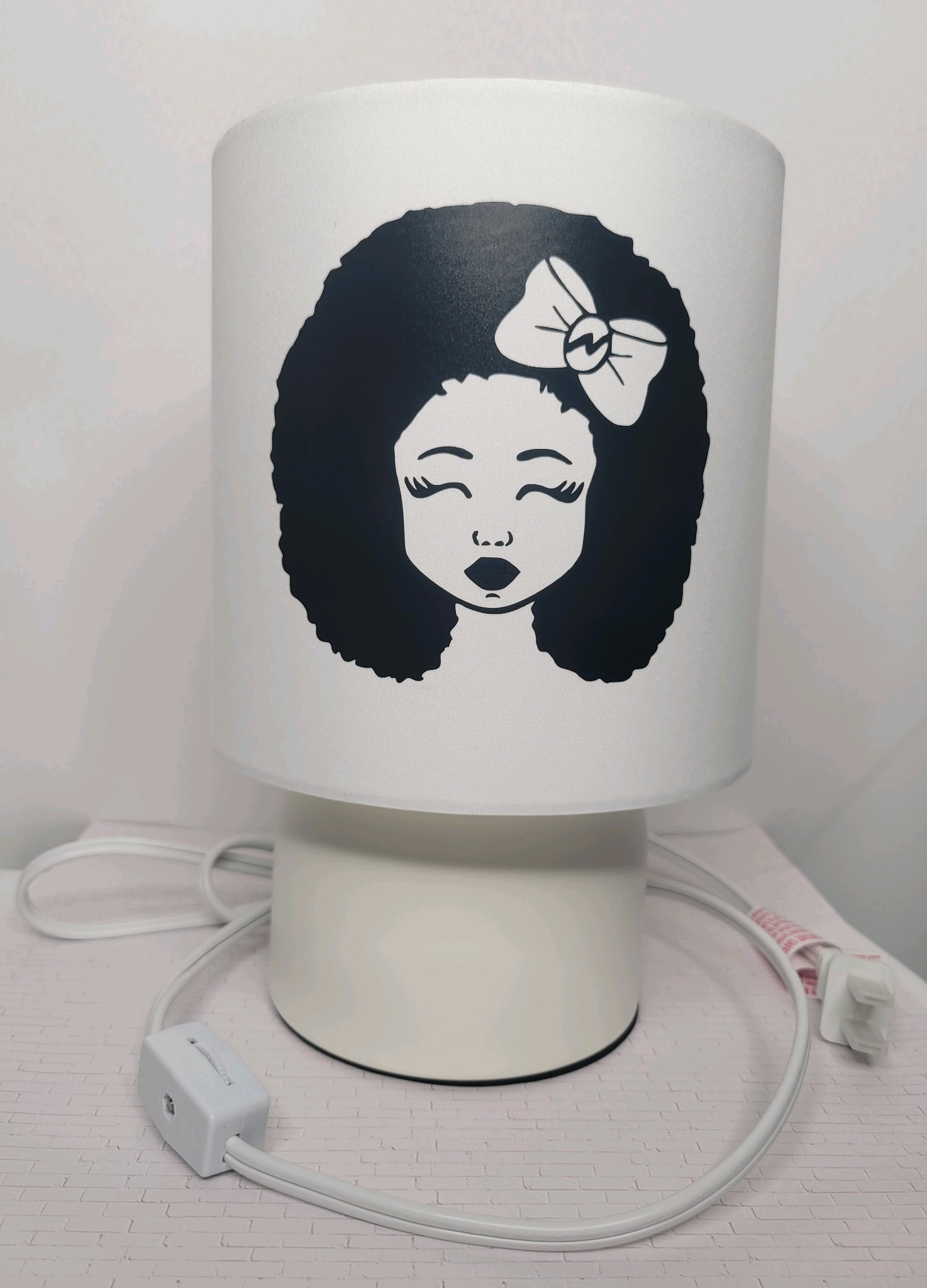 Baby girl lamp in daylight